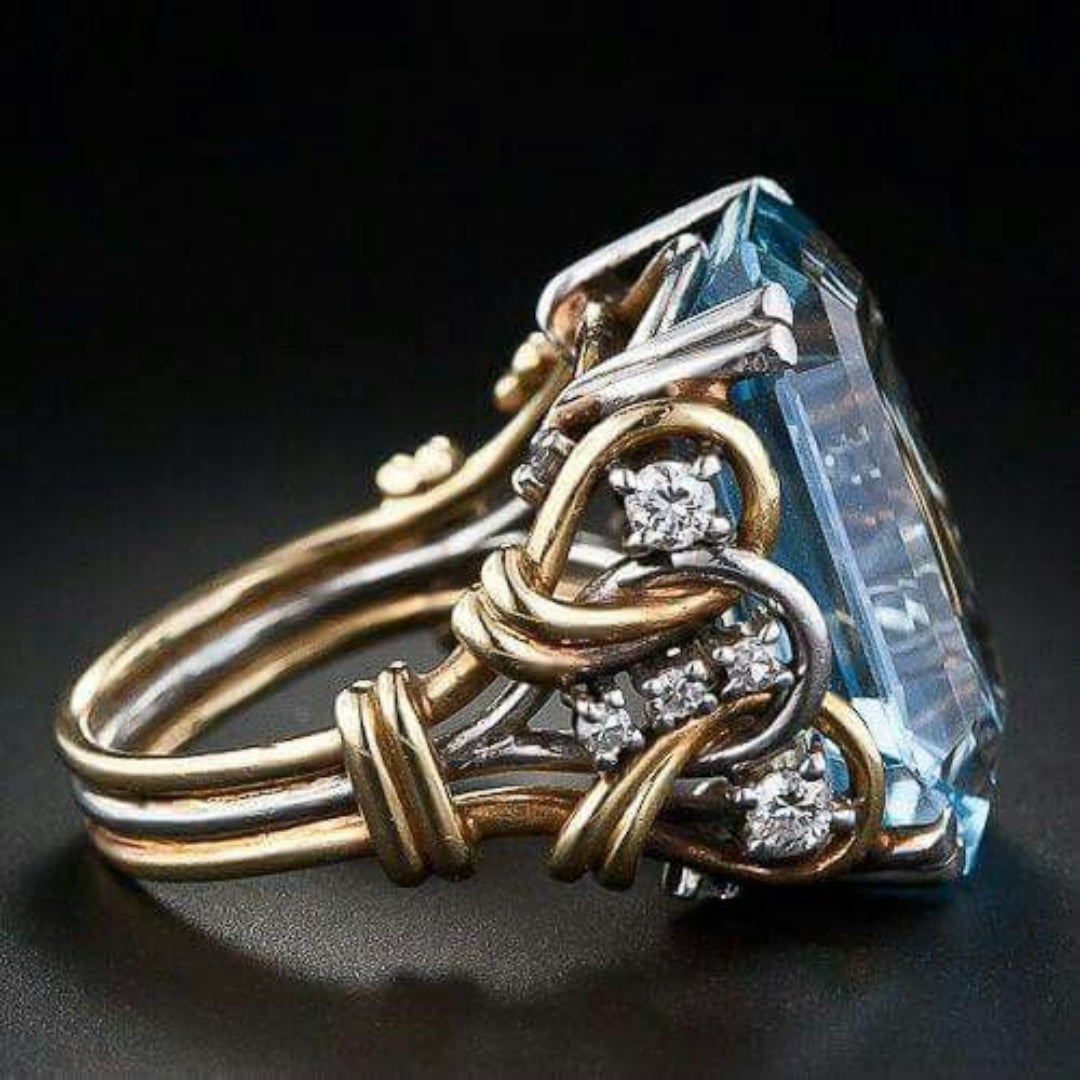 Anillo vintage de oro con capas de circonita azul